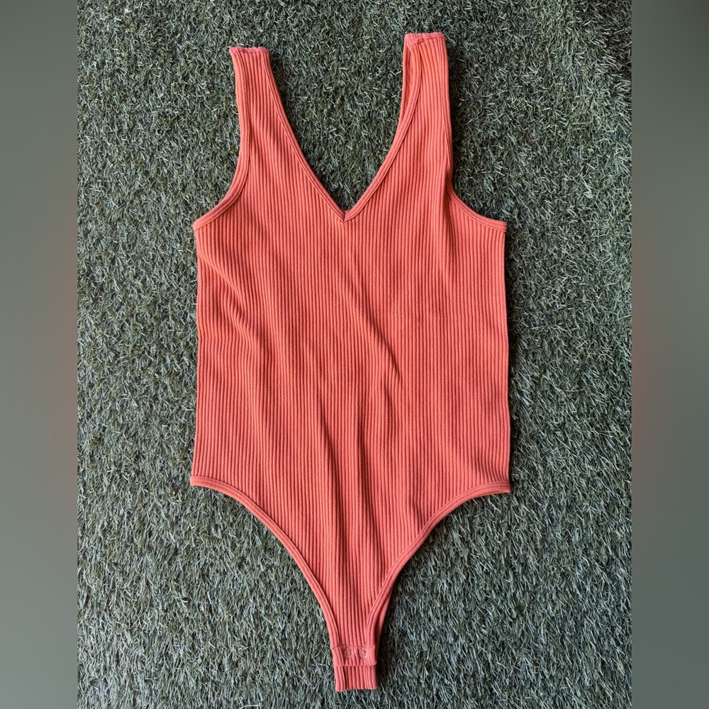 Elegant Coral Ribbed Bodysuit